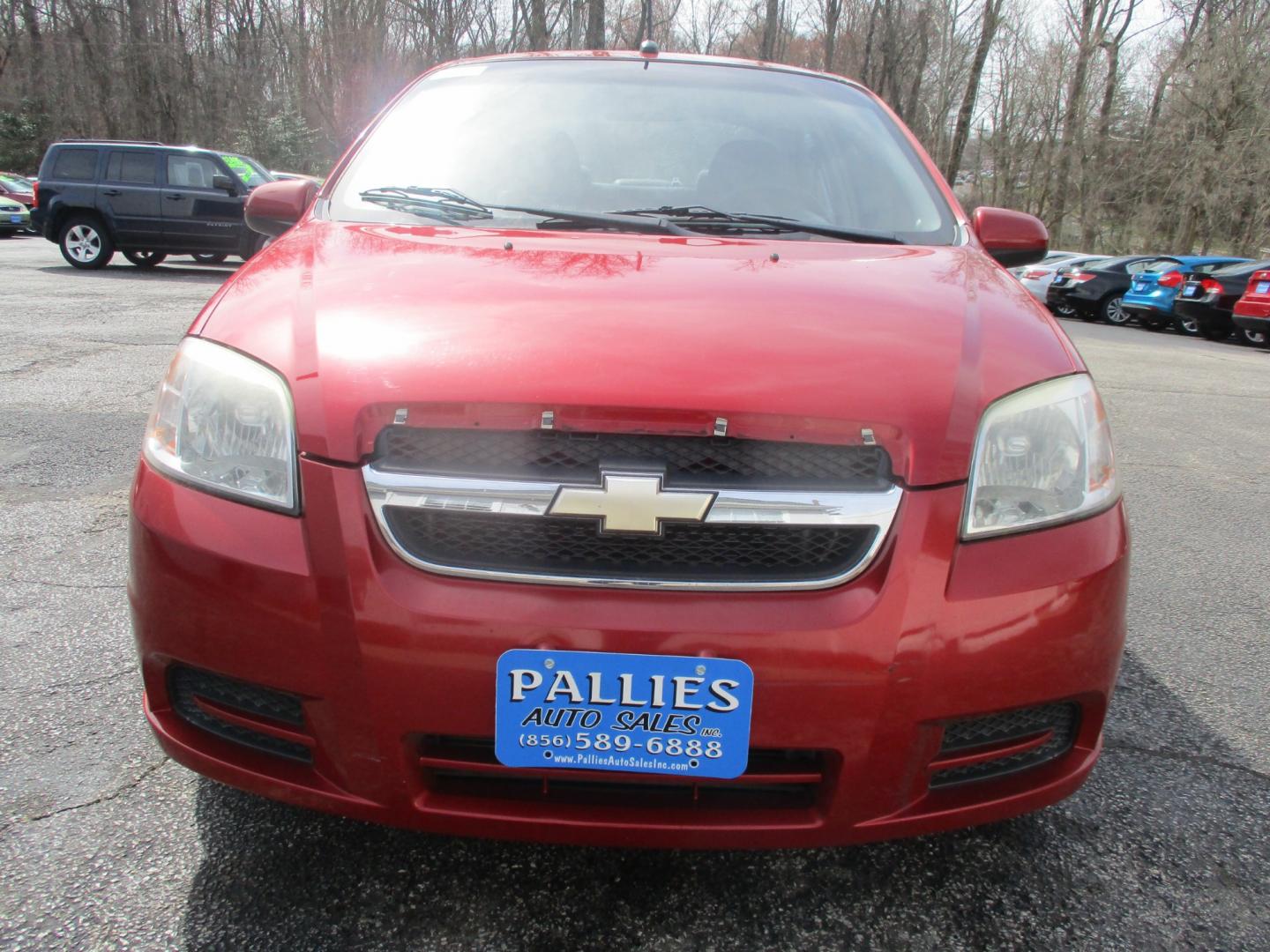 2011 RED Chevrolet Aveo (KL1TD5DE6BB) with an 1.6L L4 DOHC 16V engine, AUTOMATIC transmission, located at 540a Delsea Drive, Sewell, NJ, 08080, (856) 589-6888, 39.752560, -75.111206 - Photo#9